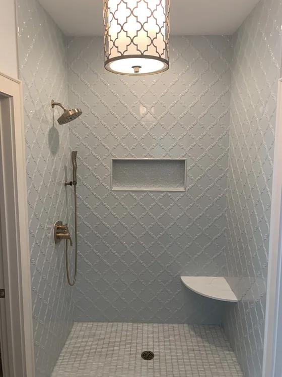 Finished tiled shower with built-in niche